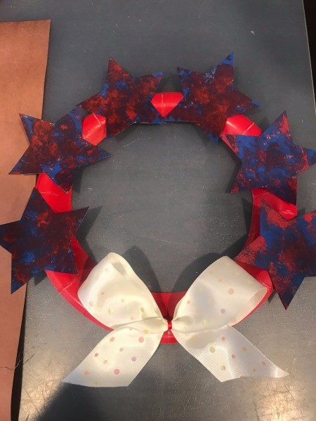 Recycled Paper Memorial Day Wreath - bow positioned and stars glued in place
