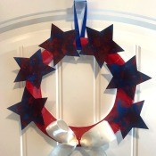 Recycled Paper Memorial Day Wreath - finished wreath hanging on over the door hook