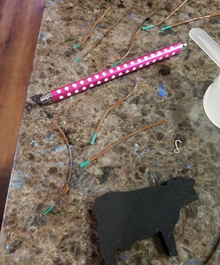 Spring Calving Season Cowboy/Cowgirl Wreath - black cow and painted twist ties