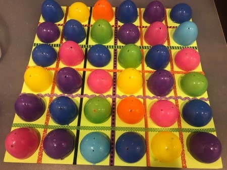Plastic Egg Match-Up Game - all items covered by egg halves