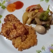 Noodle Pancakes on plate with veggies