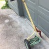 Value of a Vintage Reel Trimmer - edge trimmer on driveway