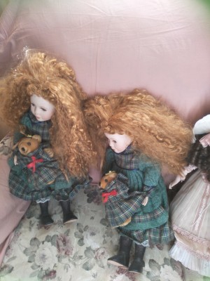 Identifying a Porcelain Doll - two dolls with combed out hair