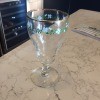 Identifying Vintage Drinking Glasses - gold rim trimmed, stemmed glass with blue floral and leaf pattern around the top