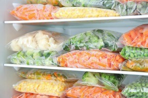 Bags of vegetables in the freezer.