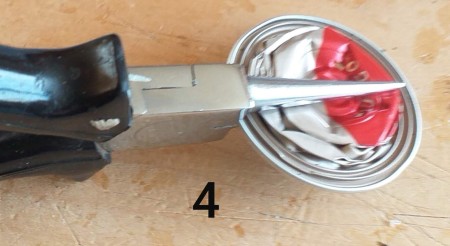 Orchid Made from Empty Nespresso Coffee Cups - hold flat capsule with pliers and fold in half