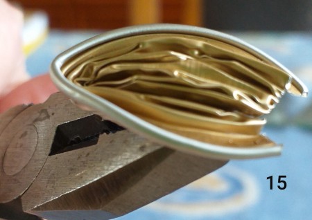 Orchid Made from Empty Nespresso Coffee Cups - hold halves with pliers and bend open