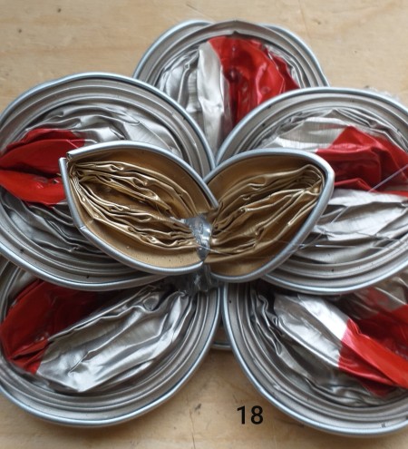 Orchid Made from Empty Nespresso Coffee Cups - hot glue the two other capsules and the center two halves