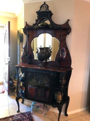 Identifying a Mirrored Hutch - perhaps antique hutch, with mirrored top, glass door on lower half, several shelves and quite ornate