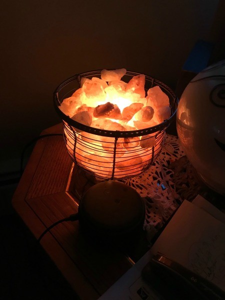 A decorative light in a darkened room.