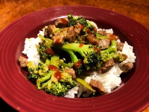 Easy Beef and Broccoli on rice in bowl