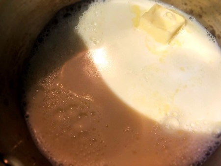 melting butter in milk in pan