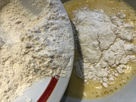 adding flour to wet ingredients