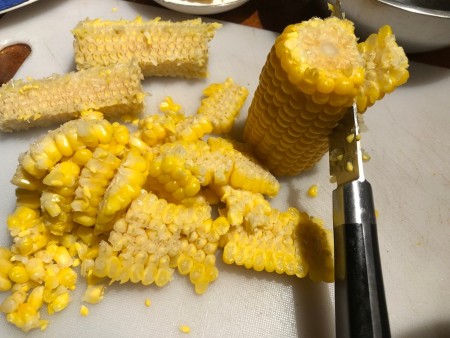 cutting corn off the cob