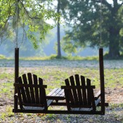 A hanging chair swing outside.