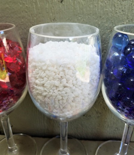 Red, White, and Blue Decor - small white decorative rocks in second
