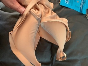 Dark Clothing Dye Transferred to Bra - peach colored bra with black stains