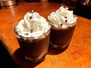 Chocolate Mousse cups covered with whipped cream