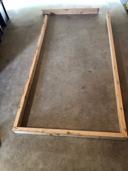 Galvanized Roofing Raised Bed - three sides of the wooden frame complete
