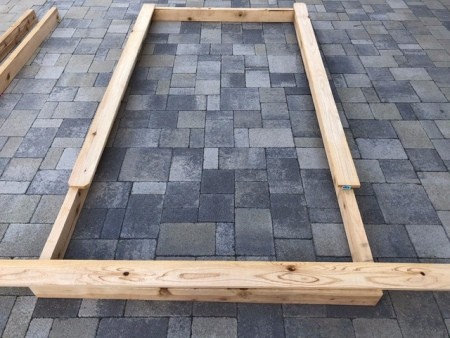 Galvanized Roofing Raised Bed - top boards being cut to fit