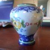 Value of Ceramic Vases - vase with blue pattern around top and bottom and floral band around the middle
