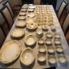 Age of Noritake Goldmount Set - china laid out on dining table