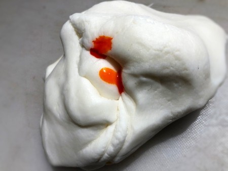 Gravity-Defying Ramen Cake - wad of white fondant with yellow food coloring added to make noodles