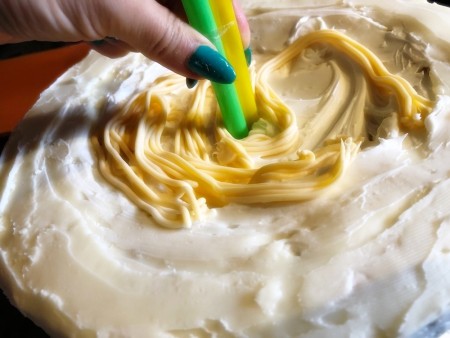 Gravity-Defying Ramen Cake - push straws into the cake and note how much needs to be covered with fondant