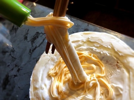 Gravity-Defying Ramen Cake - make more noodles and drape and wrap around the straws