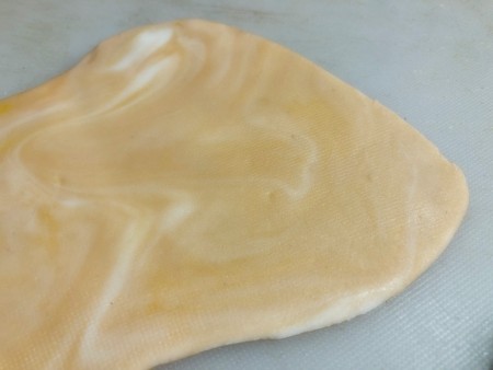 Gravity-Defying Ramen Cake - marbled white fondant with brown color to create the meat slices