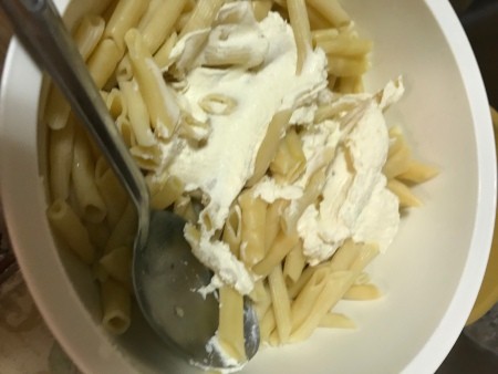 cheese added to pasta