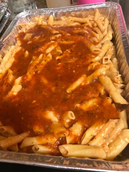pasta with cheese & pasta sauce in aluminum pans