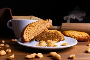 A slice of peanut butter bread on a plate.