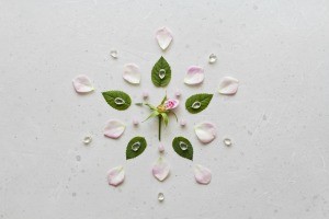 A mandala made from petals and leaves.