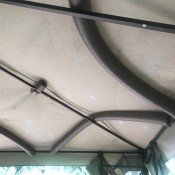 Foam tubes holding up the canvas cover of a metal gazebo.