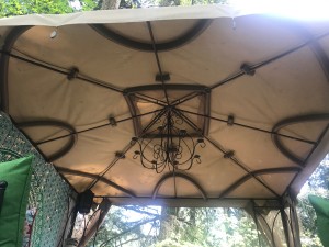 Foam tubes holding up the canvas cover of a metal gazebo.