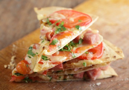 Thin pizza made from tortillas.
