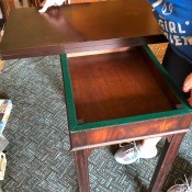 Value of a Vintage Table - table top folded in half exposing the box like interior of the table