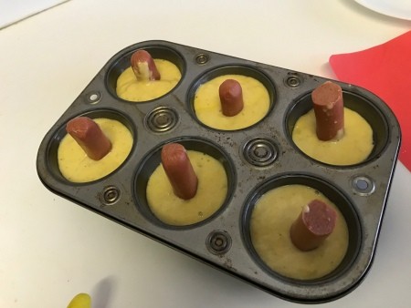 hot dog pieces in center of muffins