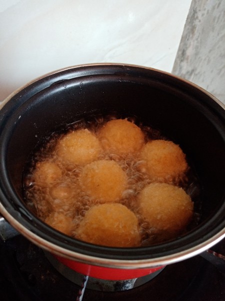 frying Cheese Filled Potato Balls