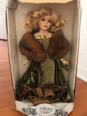 Value of a Collector's Choice Porcelain Doll - doll in box, wearing an evening gown and a fur stole