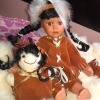 Value of a Palmary Collection Porcelain Doll - generic Native American doll