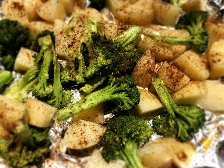 Roasted vegetables on a sheet pan.