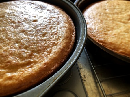 Two layer cakes baked in round cake pans.