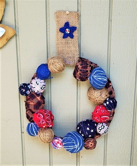 Americana Ball Wreath - finished wreath hanging on exterior wall
