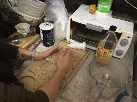 Kneading the pie crust.