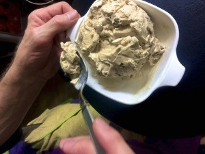 A bowl of butter pecan ice cream.