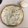 A finished orange meringue pie.