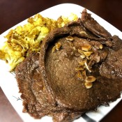 A finished plate of garlic honey balsamic steaks.