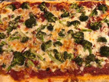 Baked roasted lemon broccoli pizza.
